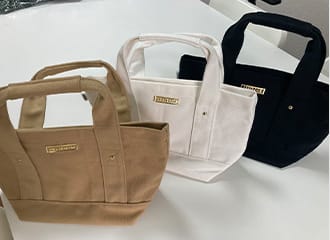 洋服から小物まで幅広い商品を製造